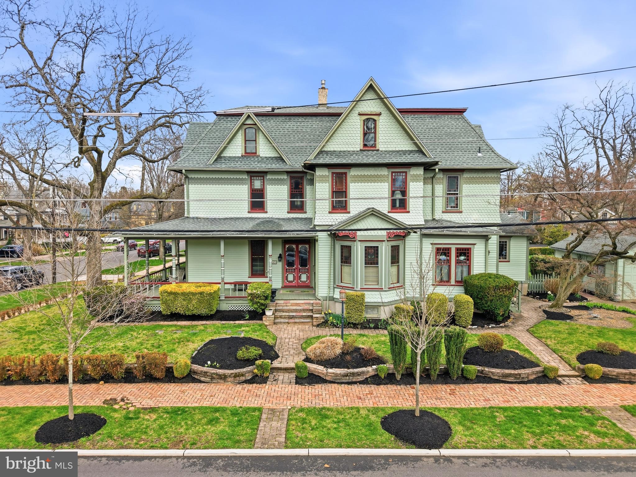 323 Washington Avenue Haddonfield, NJ 08033 - Photo 7 of 57 a front view of a house with a yard
