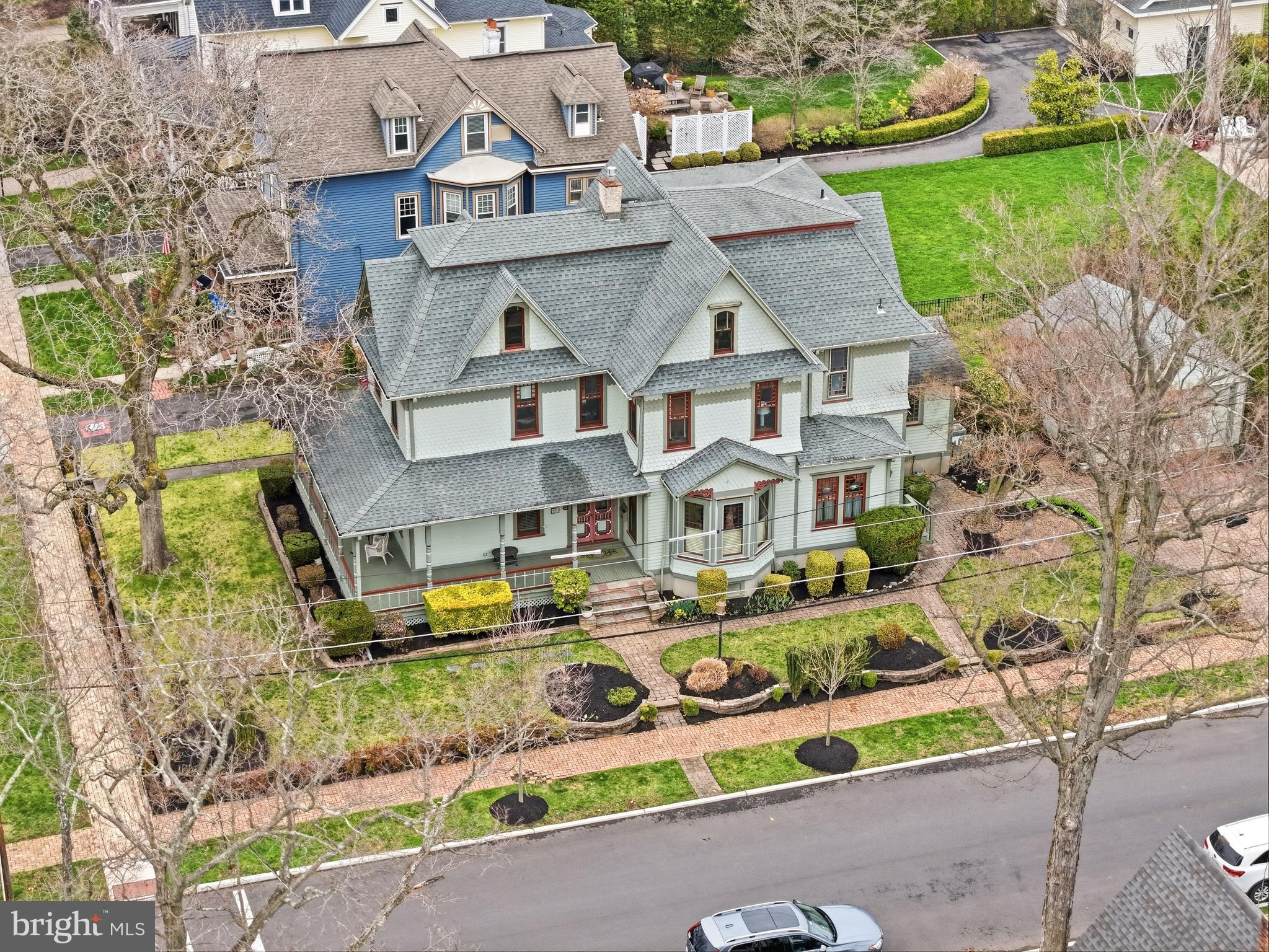323 Washington Avenue Haddonfield, NJ 08033 - Photo 10 of 57 an aerial view of a house with a garden and lake view