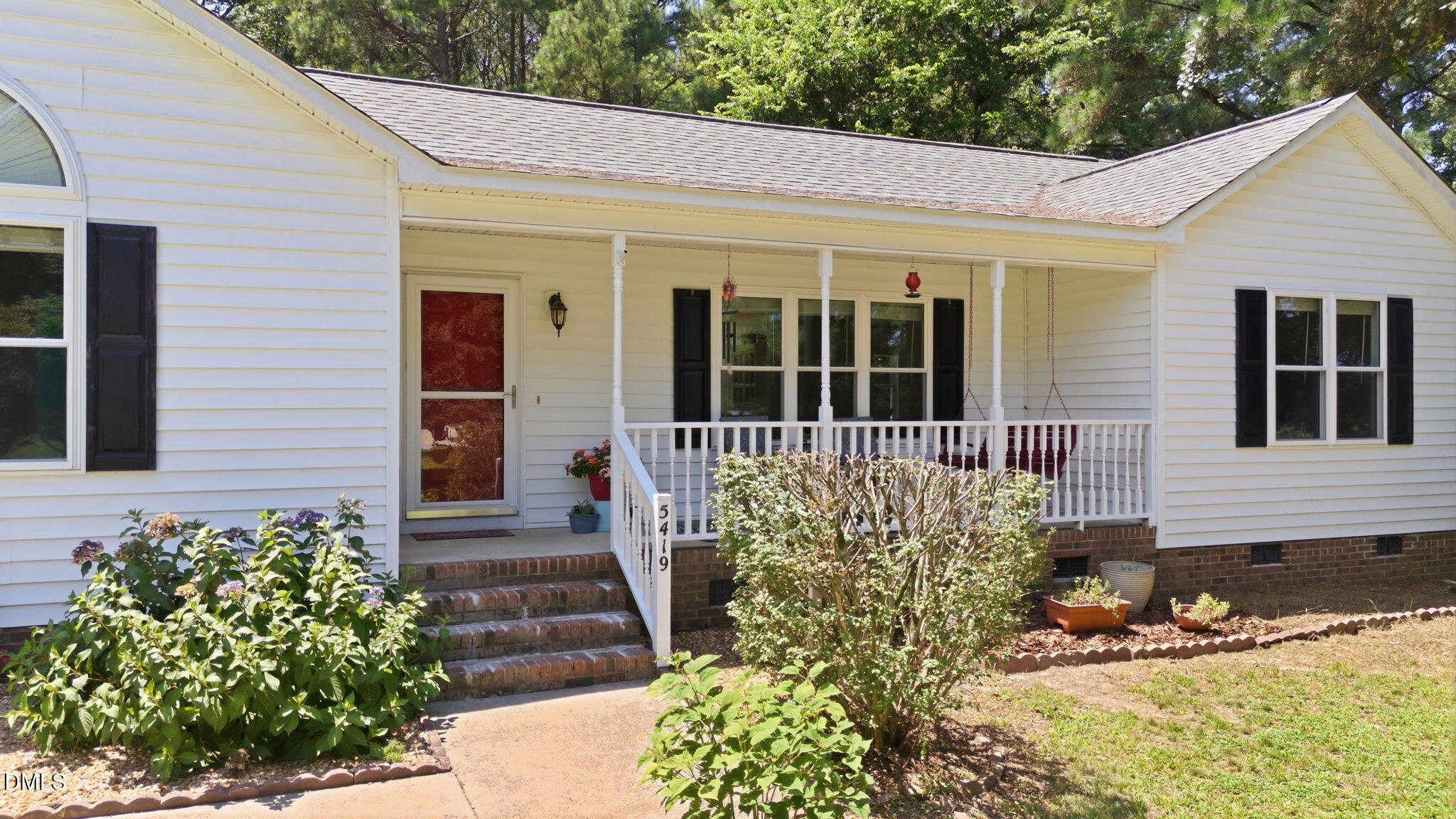 5419 Cleveland Road Clayton, NC 27520 - Photo 3 of 39 Covered front porch with classic charm