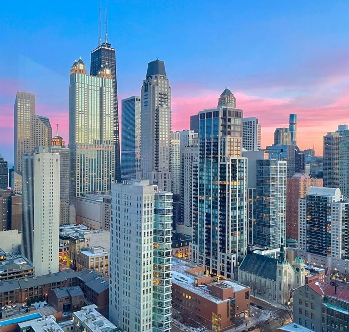 111 West Maple Street, Unit 3201 Chicago, IL 60610 - Photo 20 of 24 a city view with tall buildings