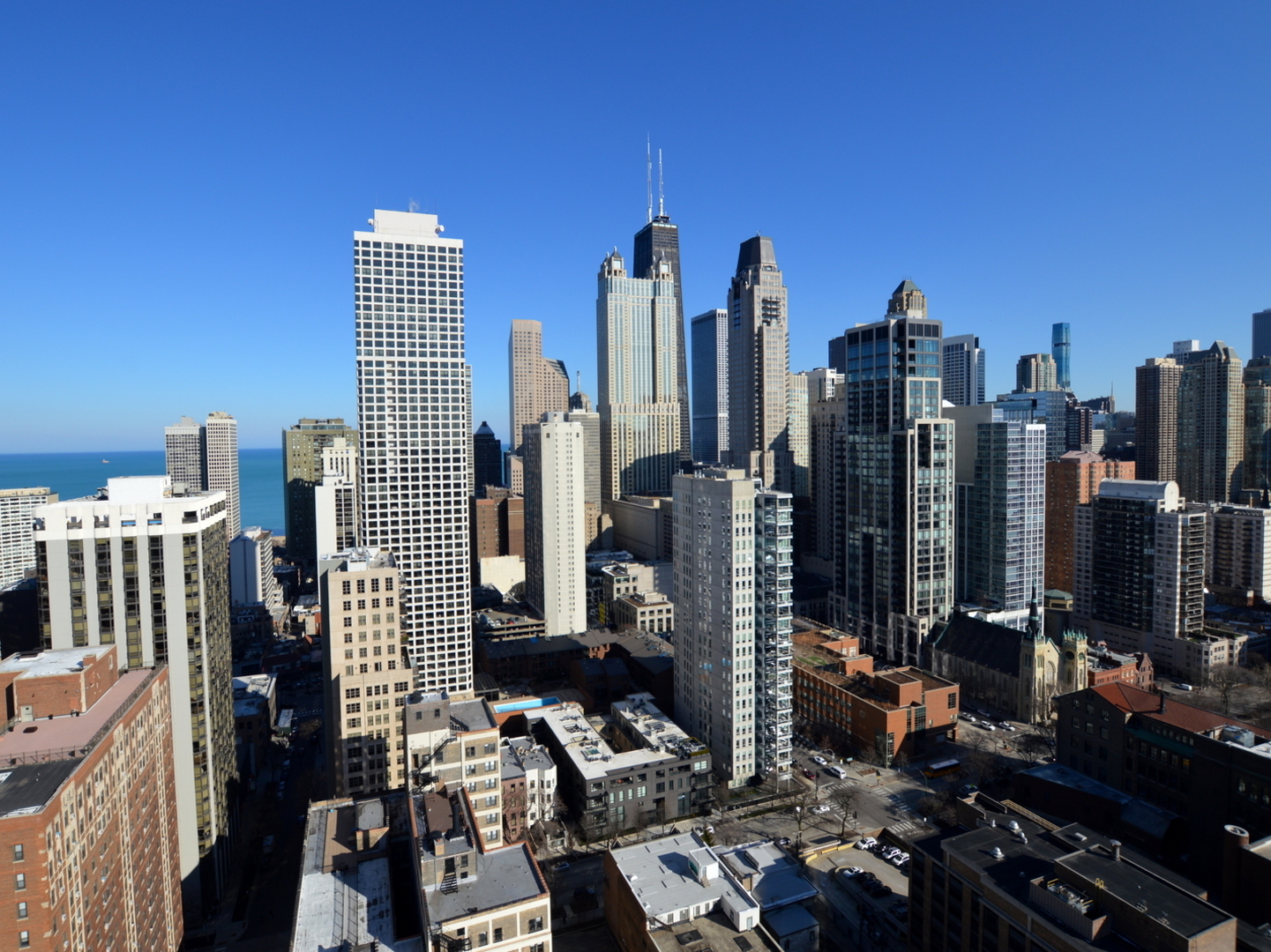 111 West Maple Street, Unit 3201 Chicago, IL 60610 - Photo 4 of 24 a view of city with tall buildings