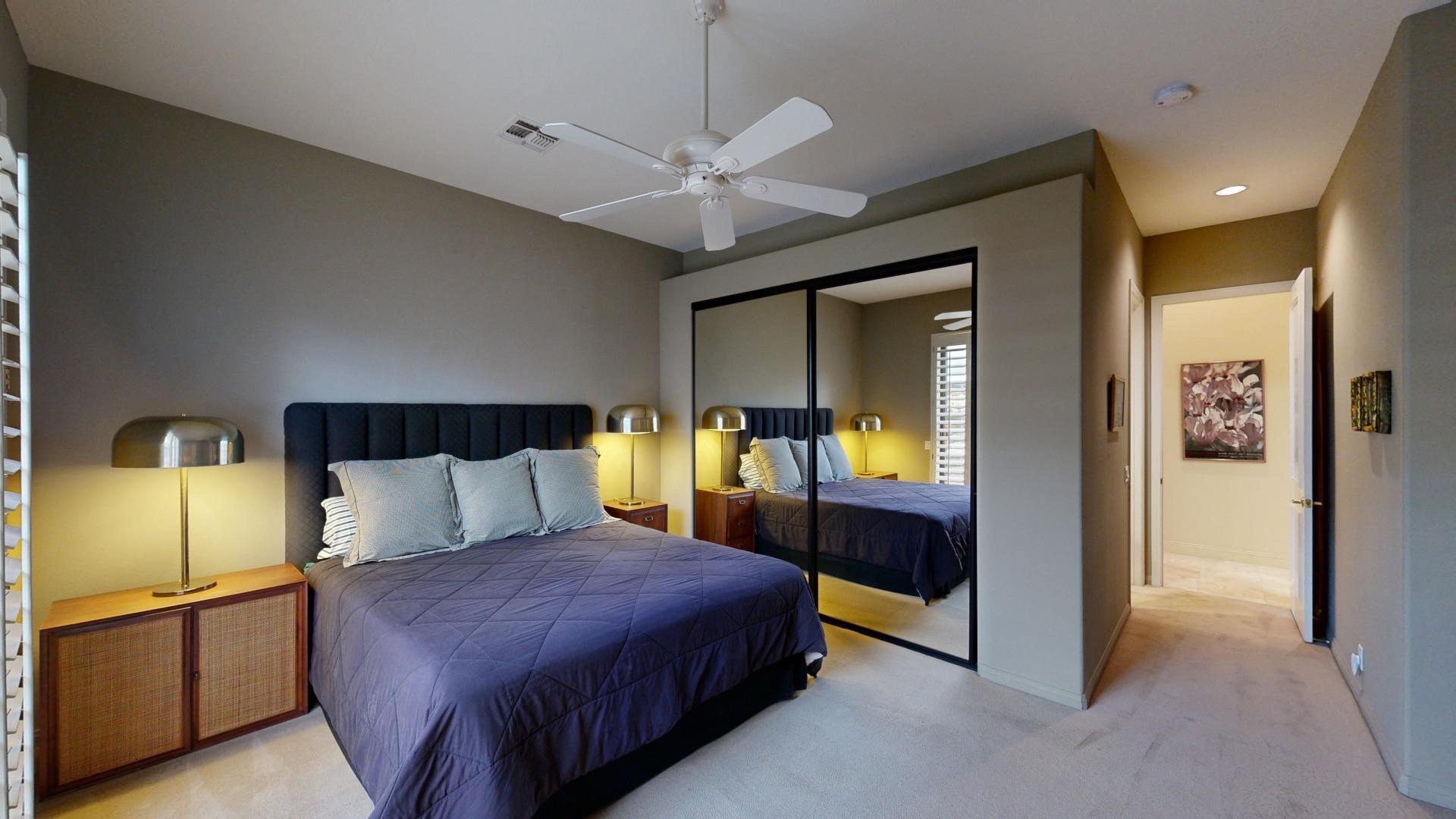 70410 Cobb Road Rancho Mirage, CA 92270 - Photo 50 of 75 a bedroom with a bed and a mirror