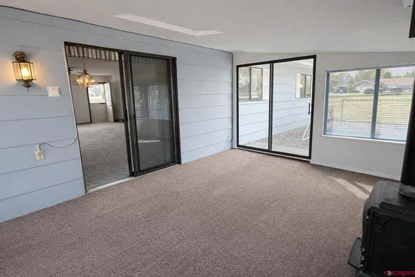 a view of empty room with front door