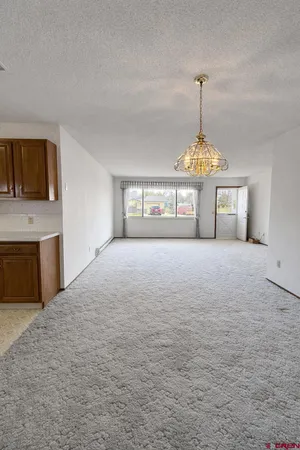 a view of empty room with windows