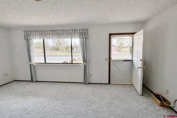 an empty room with window