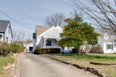 a view of a house with a back yard