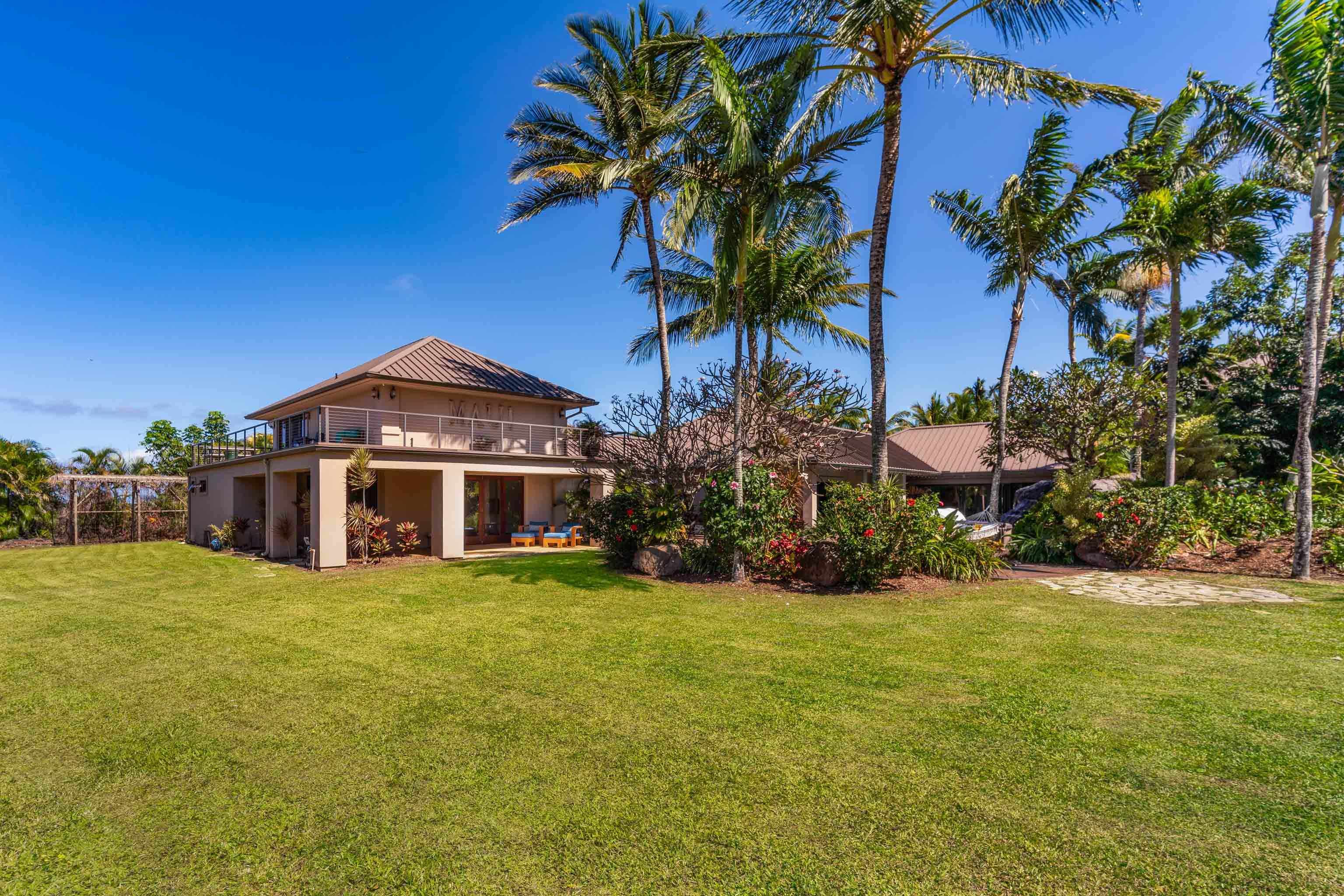 166 Apuwai Street Haiku, HI 96708 - Photo 16 of 30 a view of a house with a yard