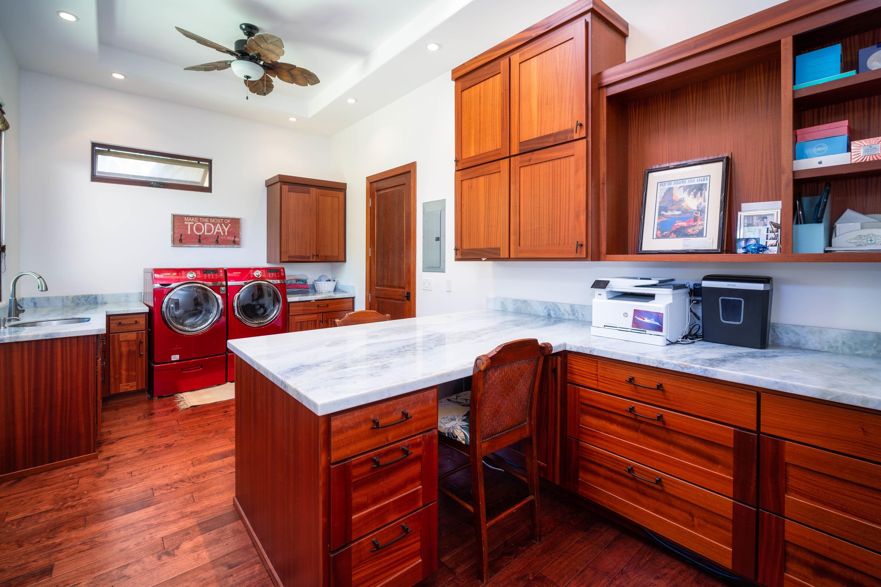 166 Apuwai Street Haiku, HI 96708 - Photo 18 of 30 a kitchen with stainless steel appliances granite countertop a sink and a microwave