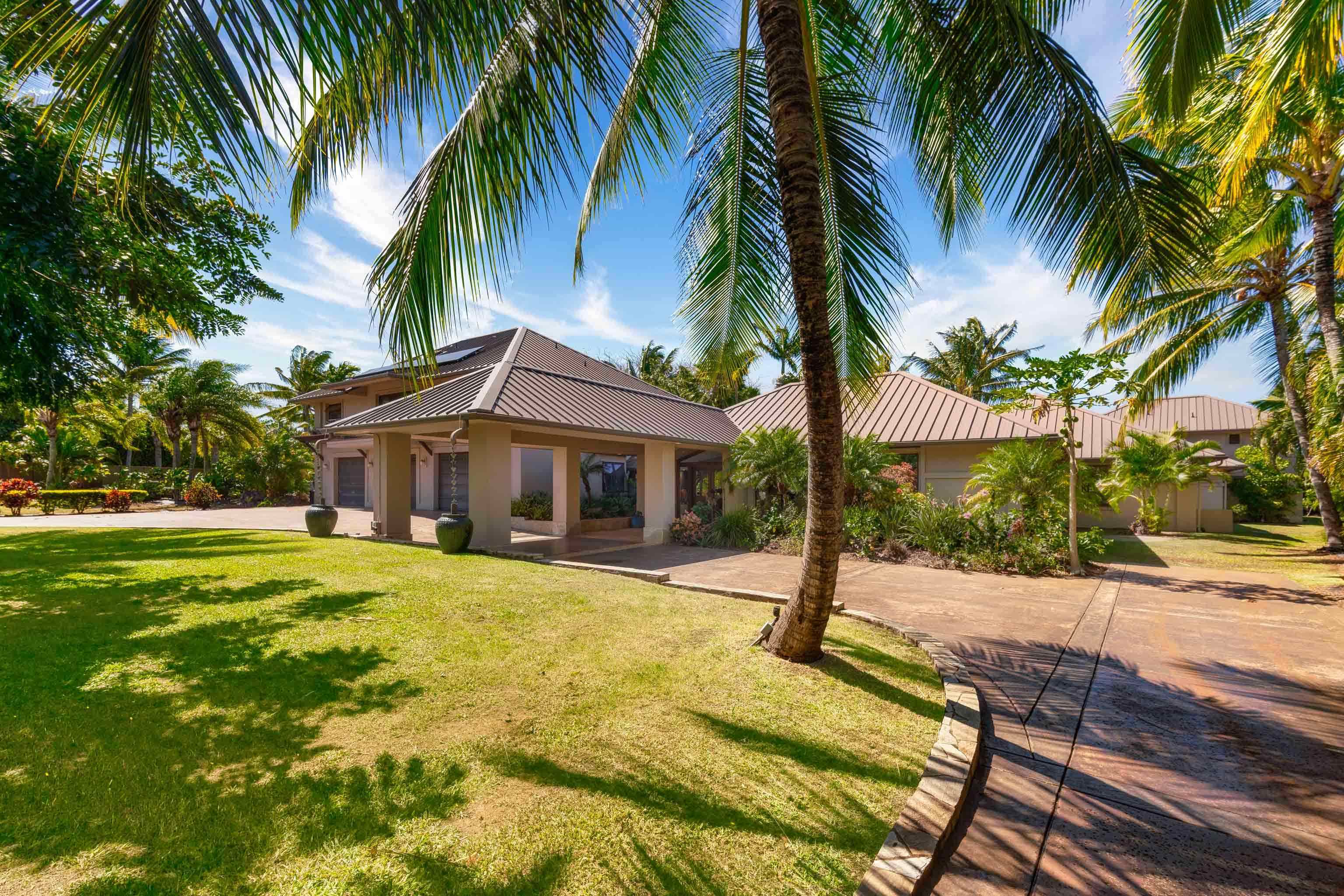 166 Apuwai Street Haiku, HI 96708 - Photo 30 of 30 a view of a house with a swimming pool