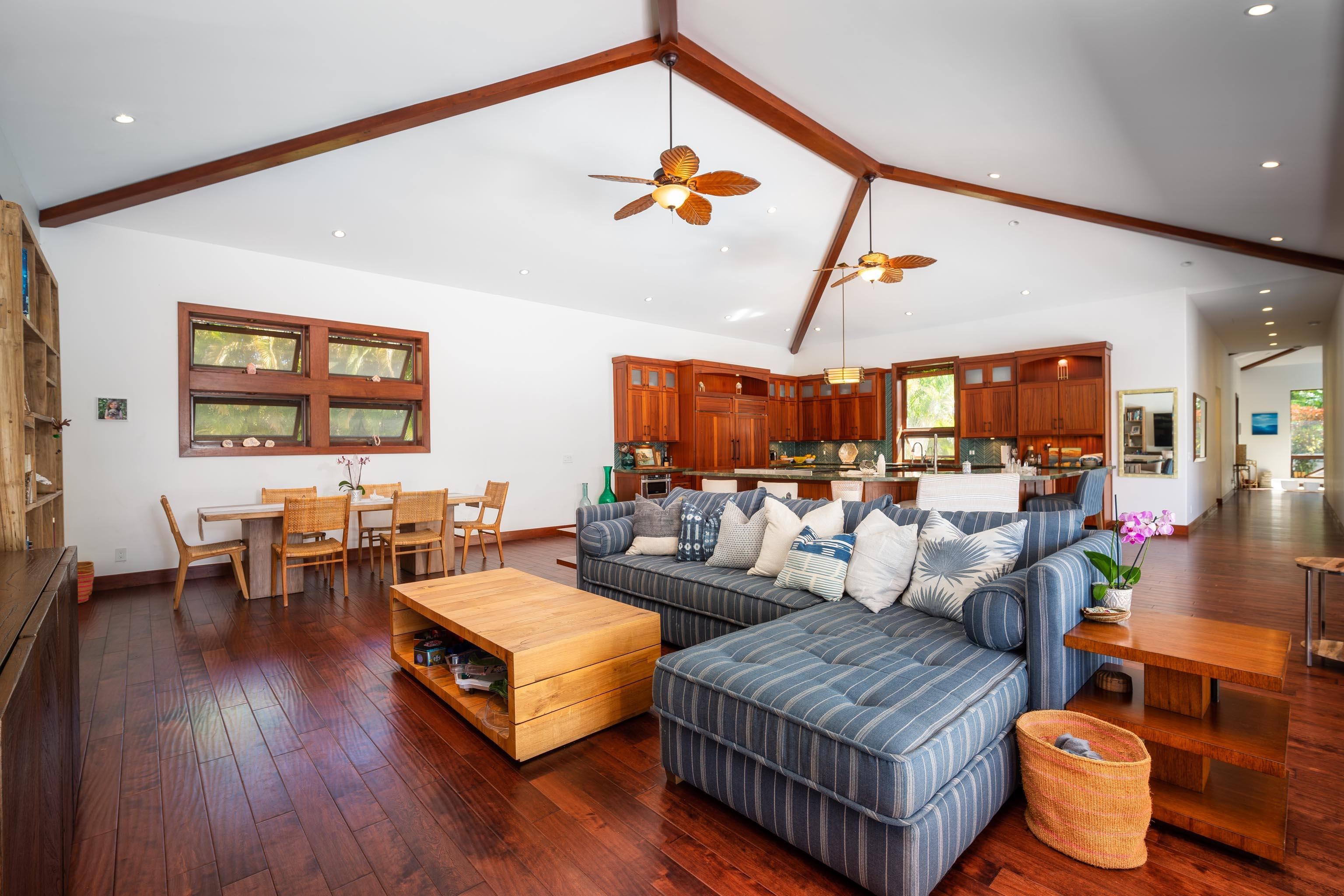 166 Apuwai Street Haiku, HI 96708 - Photo 6 of 30 a living room with furniture and wooden floor