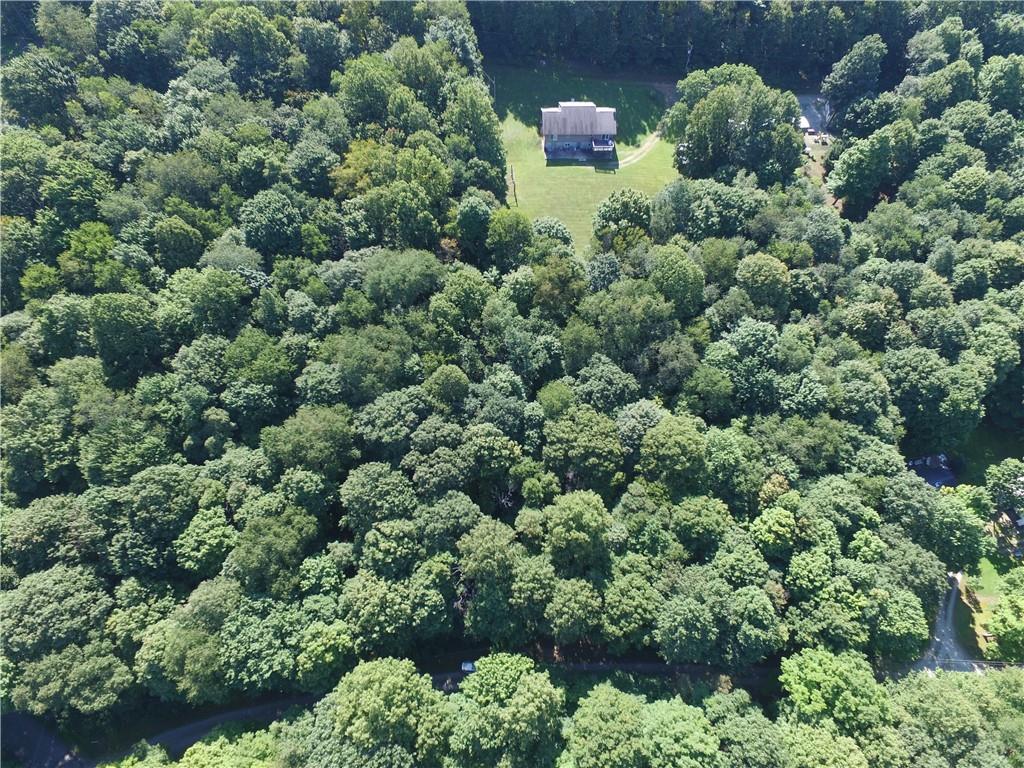 1563 Mount Zion Road Normalville, PA 15469 - Photo 2 of 11 an aerial view of a house with a yard