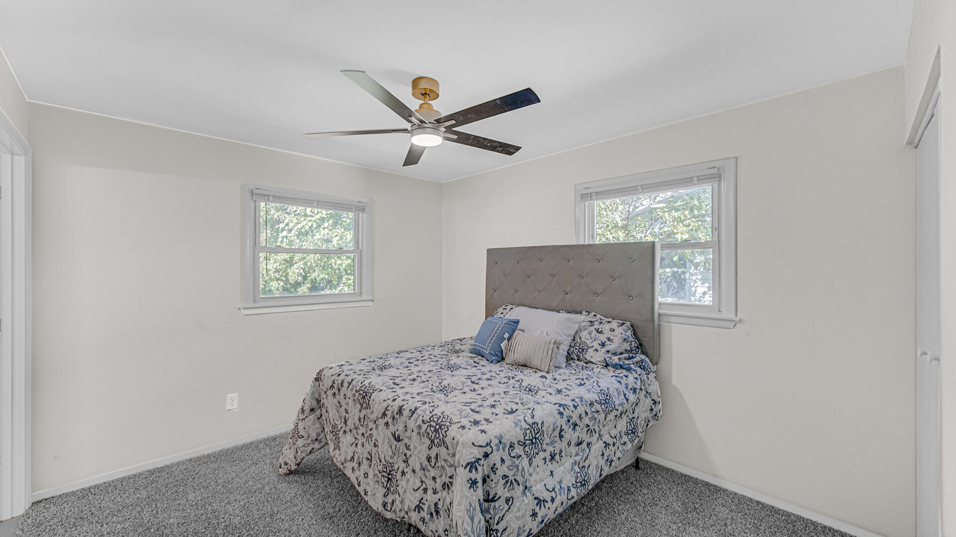 4440 East 13th Place Gary, IN 46403 - Photo 12 of 25 a bedroom with a large bed and a window