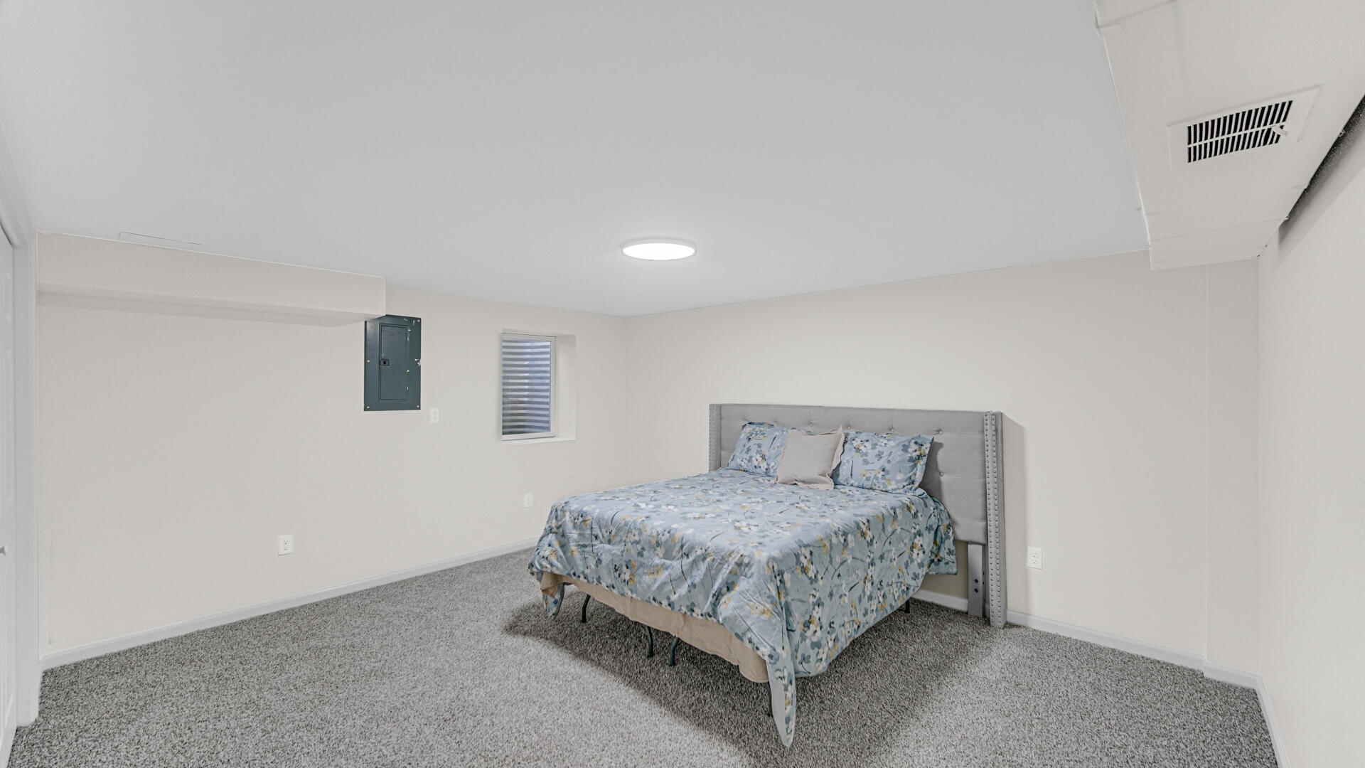 4440 East 13th Place Gary, IN 46403 - Photo 16 of 25 a bedroom with a bed and a window