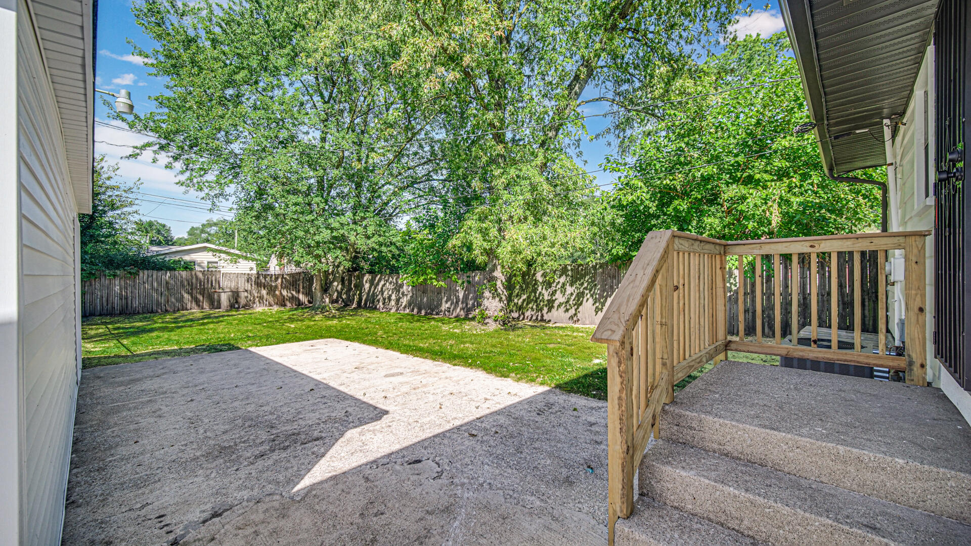4440 East 13th Place Gary, IN 46403 - Photo 24 of 25 a view of a backyard with pathway