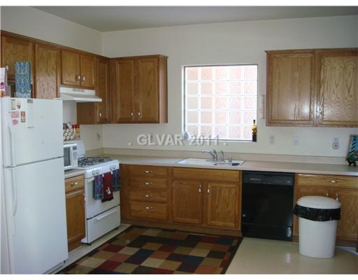 8224 Strawberry Spring Street Las Vegas, NV 89143 - Photo 3 of 8 Kitchen.