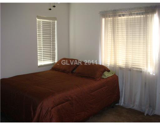8224 Strawberry Spring Street Las Vegas, NV 89143 - Photo 7 of 8 Master Bedroom.