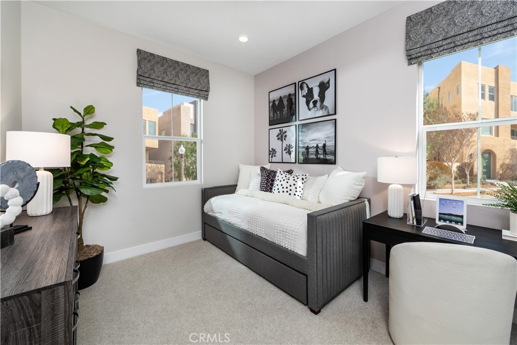 224 Lily Loop Irvine, CA 92618 - Photo 8 of 13 a bed room with a bed window and a potted plant