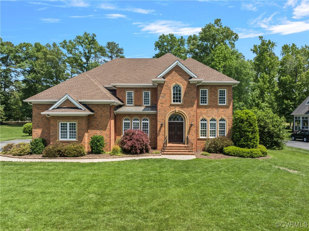 14424 Riverside Drive Ashland, VA 23005 - Photo 1 of 40 Colonial inspired home featuring a front yard, bri
