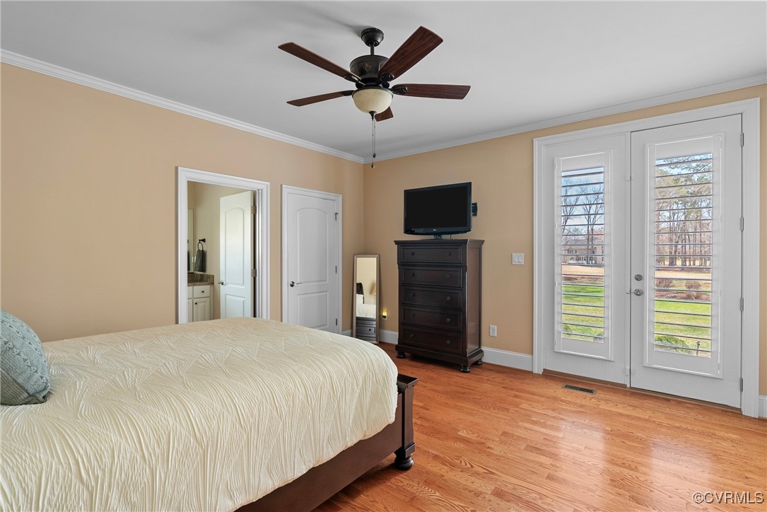 14424 Riverside Drive Ashland, VA 23005 - Photo 19 of 40 Bedroom featuring access to exterior, light wood f