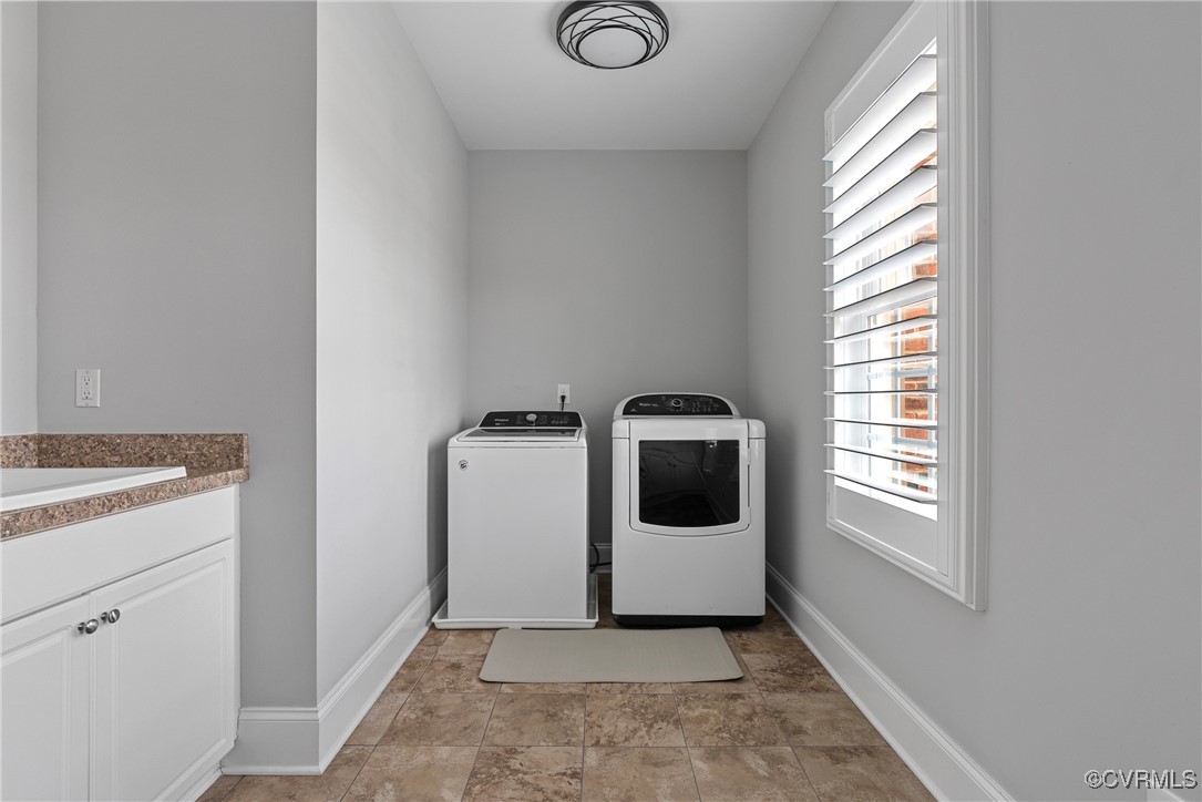 14424 Riverside Drive Ashland, VA 23005 - Photo 27 of 40 Washroom with washer and dryer, baseboards, and a