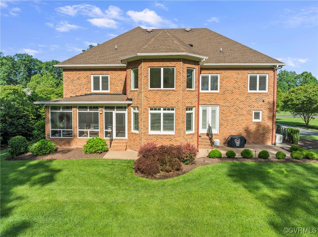 14424 Riverside Drive Ashland, VA 23005 - Photo 36 of 40 Rear view of property featuring a patio area, a su