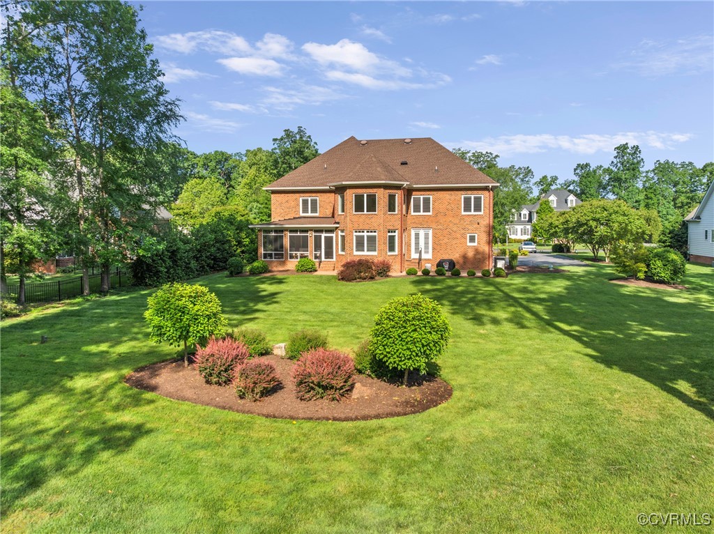 14424 Riverside Drive Ashland, VA 23005 - Photo 37 of 40 Back of house with a sunroom and brick siding