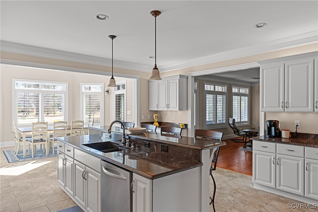 14424 Riverside Drive Ashland, VA 23005 - Photo 6 of 40 Kitchen with a breakfast bar area, a center island