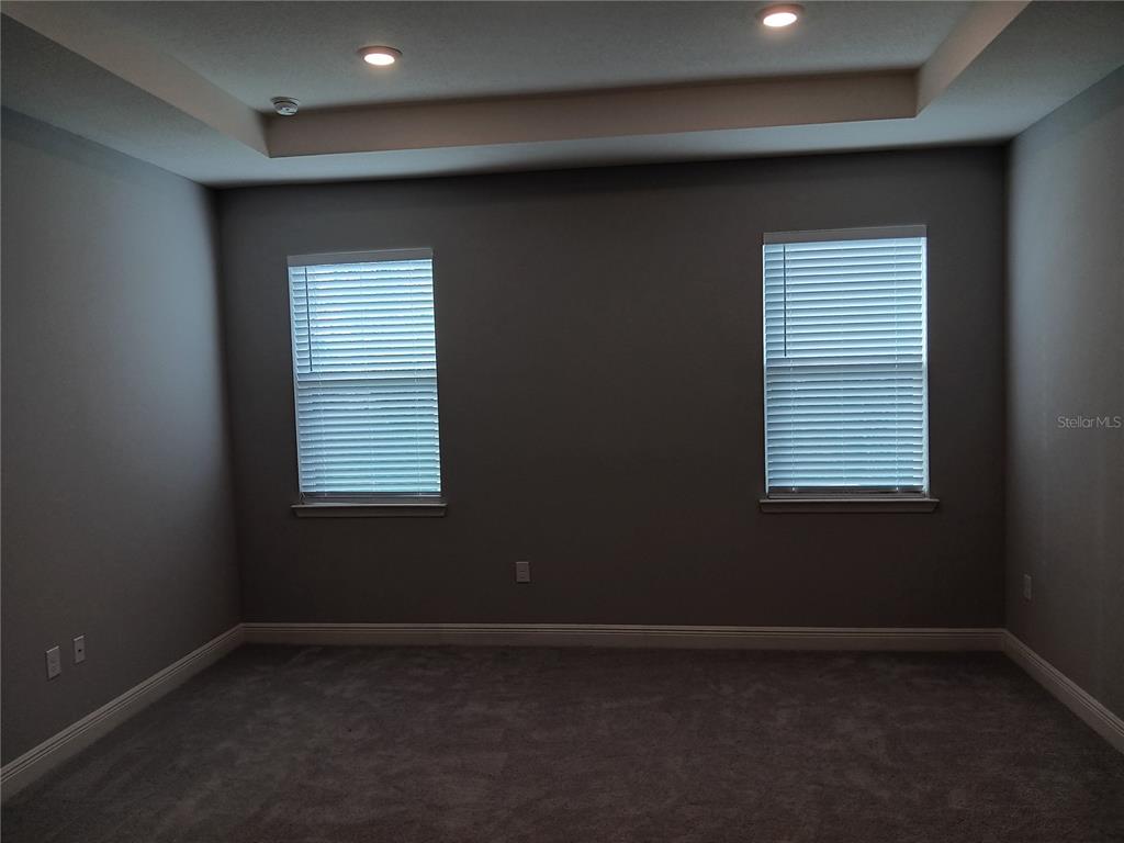 5433 Southwest 44th Ct Road Ocala, FL 34474 - Photo 10 of 24 an empty room with a window