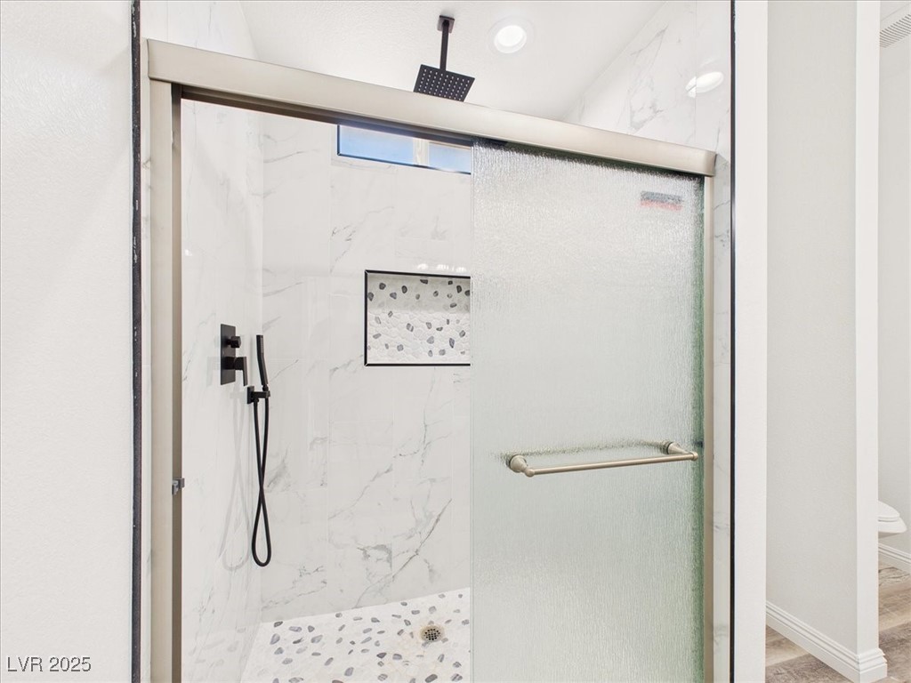 931 Lone Pine Road Pahrump, NV 89048 - Photo 18 of 48 Bathroom with a marble finish shower