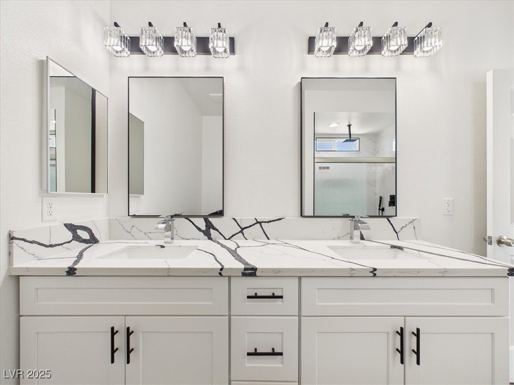 931 Lone Pine Road Pahrump, NV 89048 - Photo 19 of 48 Full bathroom featuring double vanity