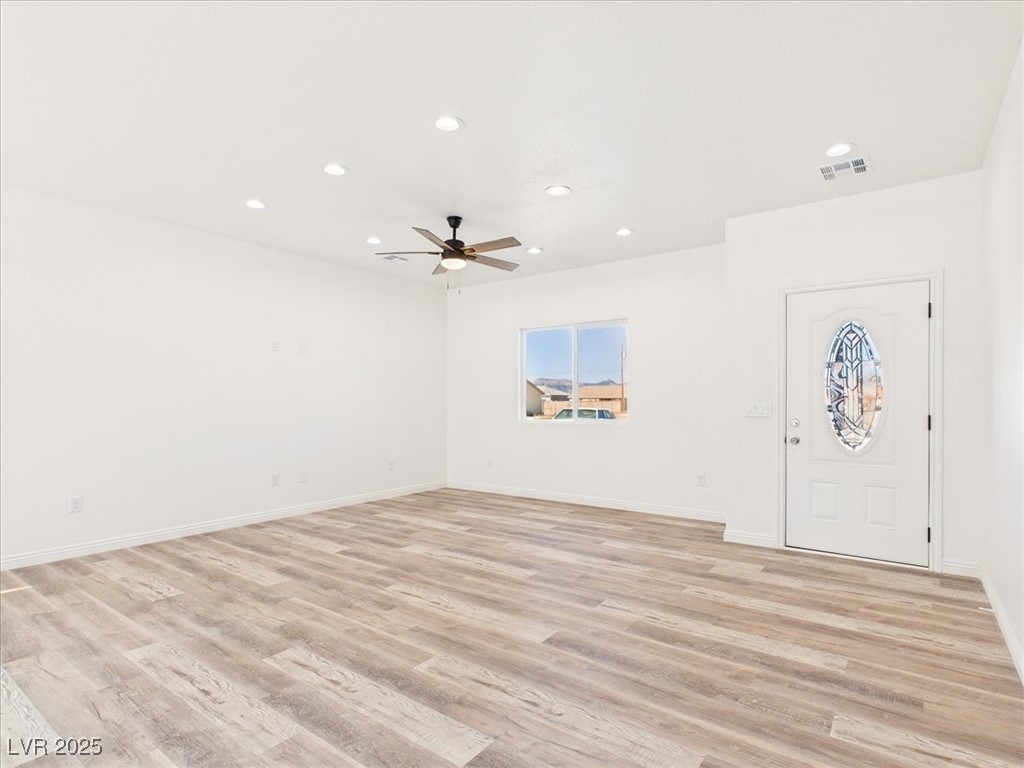 931 Lone Pine Road Pahrump, NV 89048 - Photo 2 of 48 Foyer with light wood-style flooring, recessed lighting, and ceiling fan
