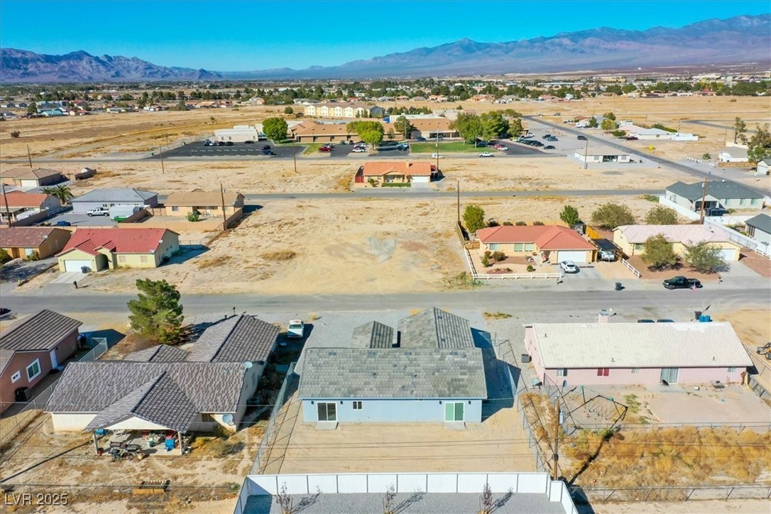 931 Lone Pine Road Pahrump, NV 89048 - Photo 44 of 48 Aerial view of residential area with mountains