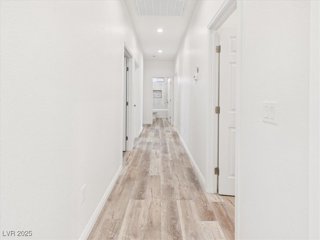 931 Lone Pine Road Pahrump, NV 89048 - Photo 9 of 48 Hall with light wood-style floors and recessed lighting