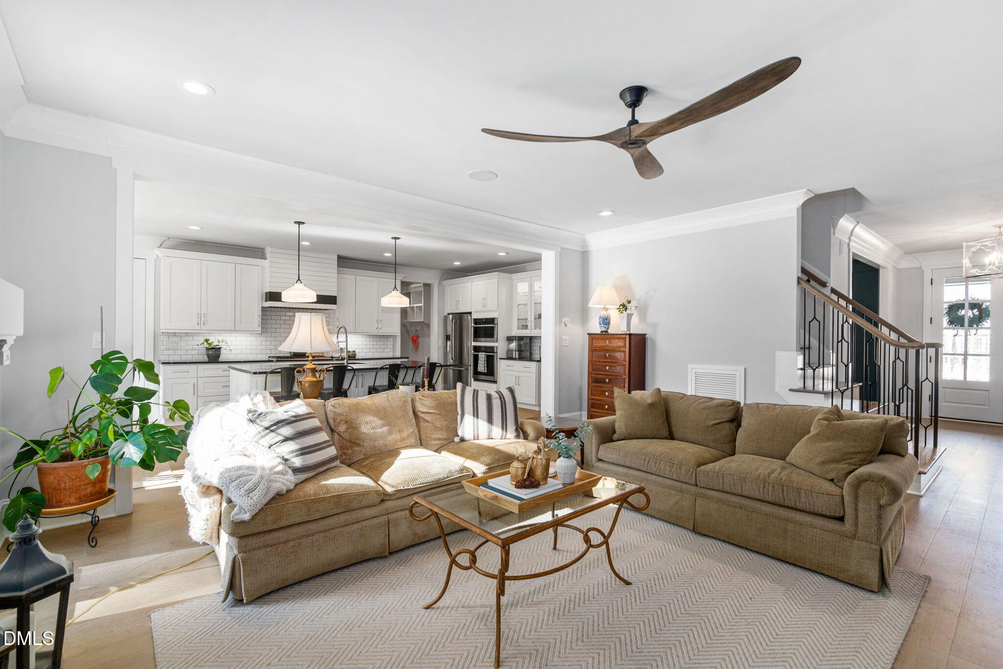 3417 Edgemont Drive Raleigh, NC 27612 - Photo 15 of 70 a living room with furniture and a ceiling fan