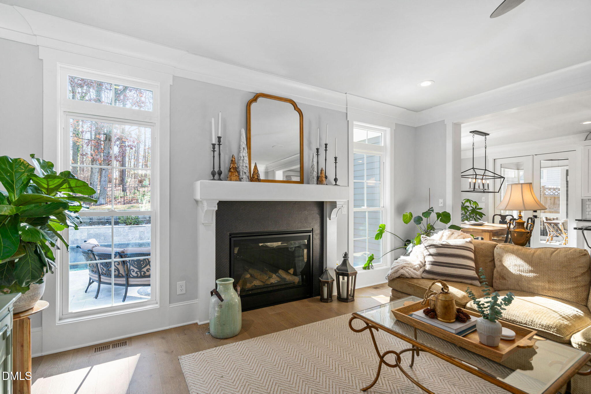 3417 Edgemont Drive Raleigh, NC 27612 - Photo 16 of 70 a living room with furniture and a fireplace