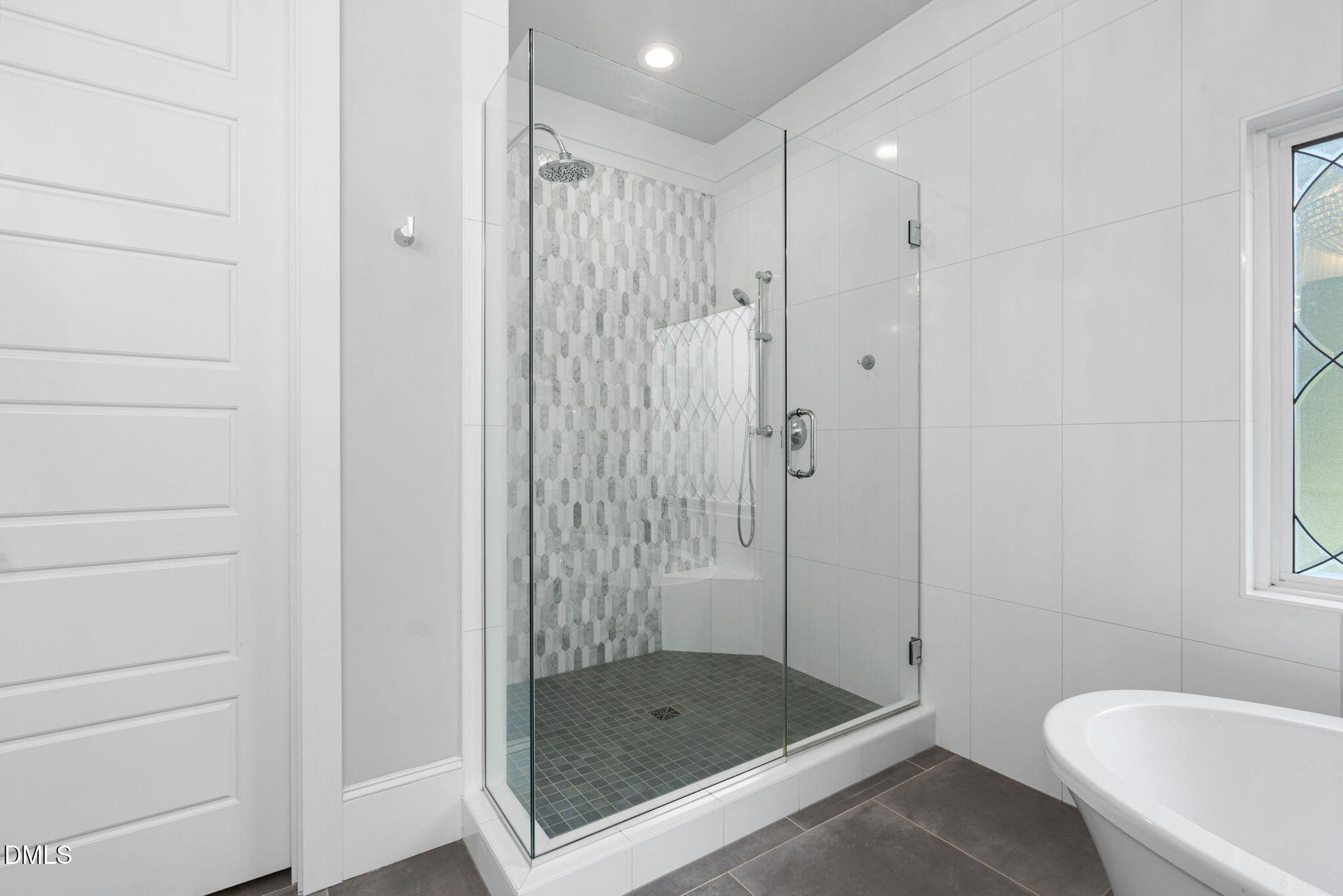 3417 Edgemont Drive Raleigh, NC 27612 - Photo 26 of 70 a bathroom with a shower and a toilet