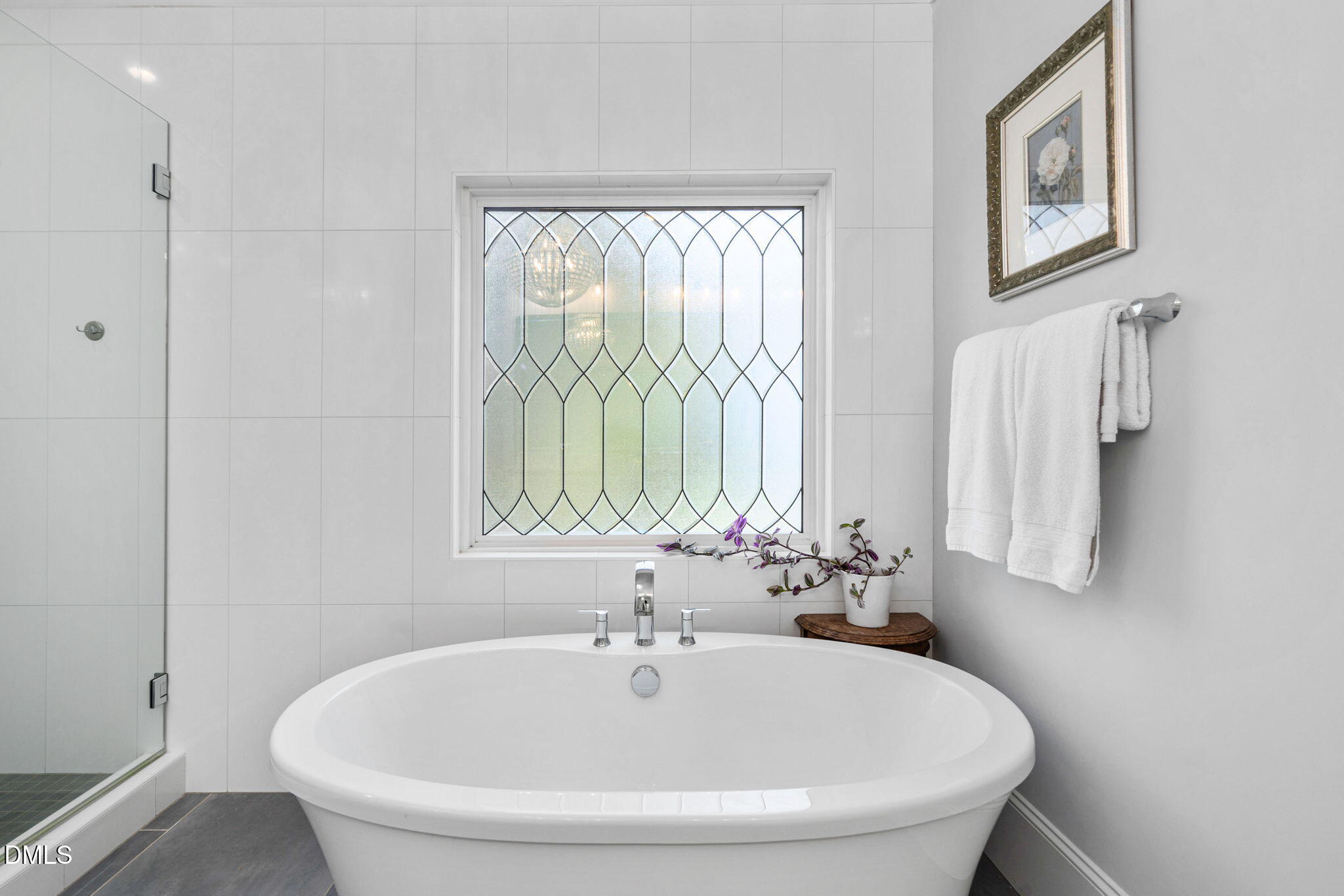 3417 Edgemont Drive Raleigh, NC 27612 - Photo 28 of 70 a white bath tub sitting next to a window