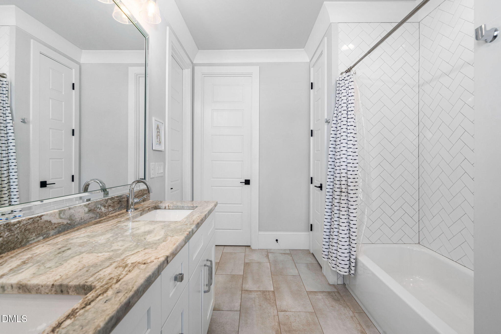 3417 Edgemont Drive Raleigh, NC 27612 - Photo 31 of 70 a bathroom with a granite countertop sink and a mirror