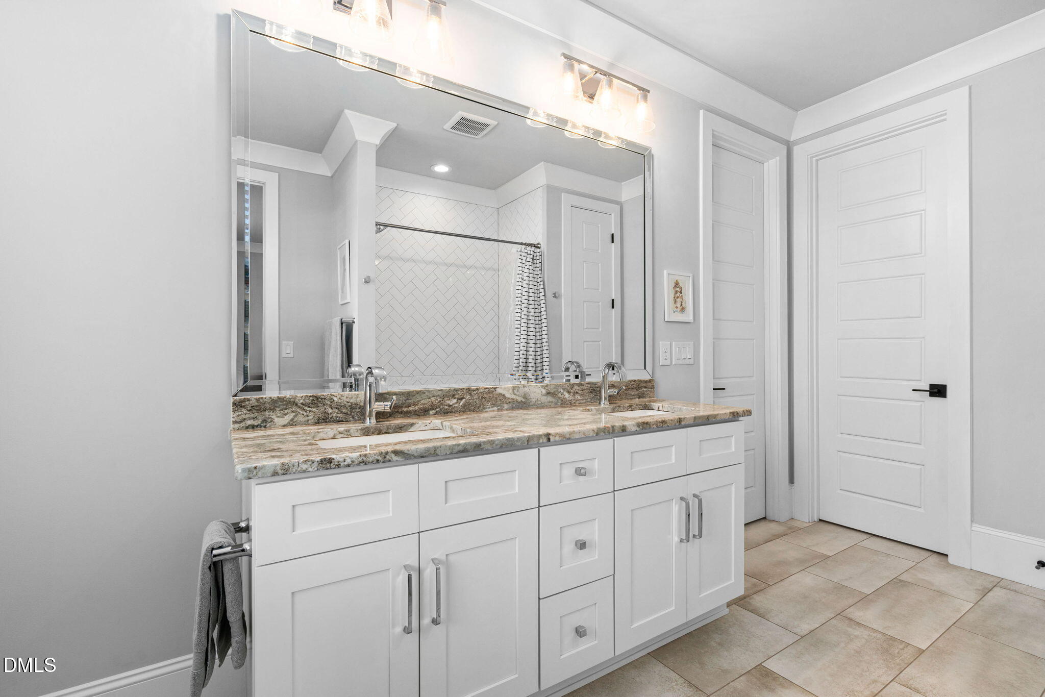 3417 Edgemont Drive Raleigh, NC 27612 - Photo 32 of 70 a bathroom with a granite countertop sink double and mirror