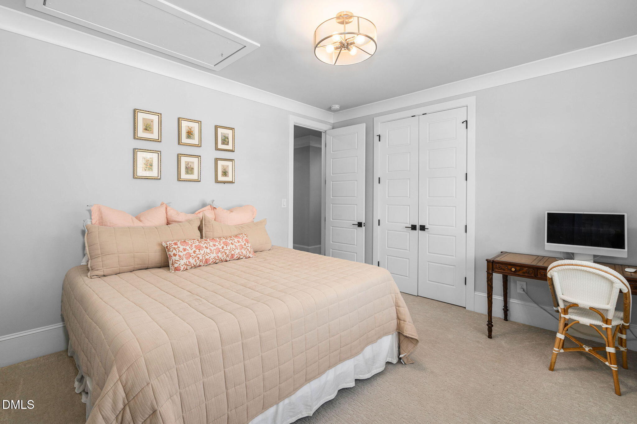 3417 Edgemont Drive Raleigh, NC 27612 - Photo 33 of 70 a bedroom with a bed and a desk