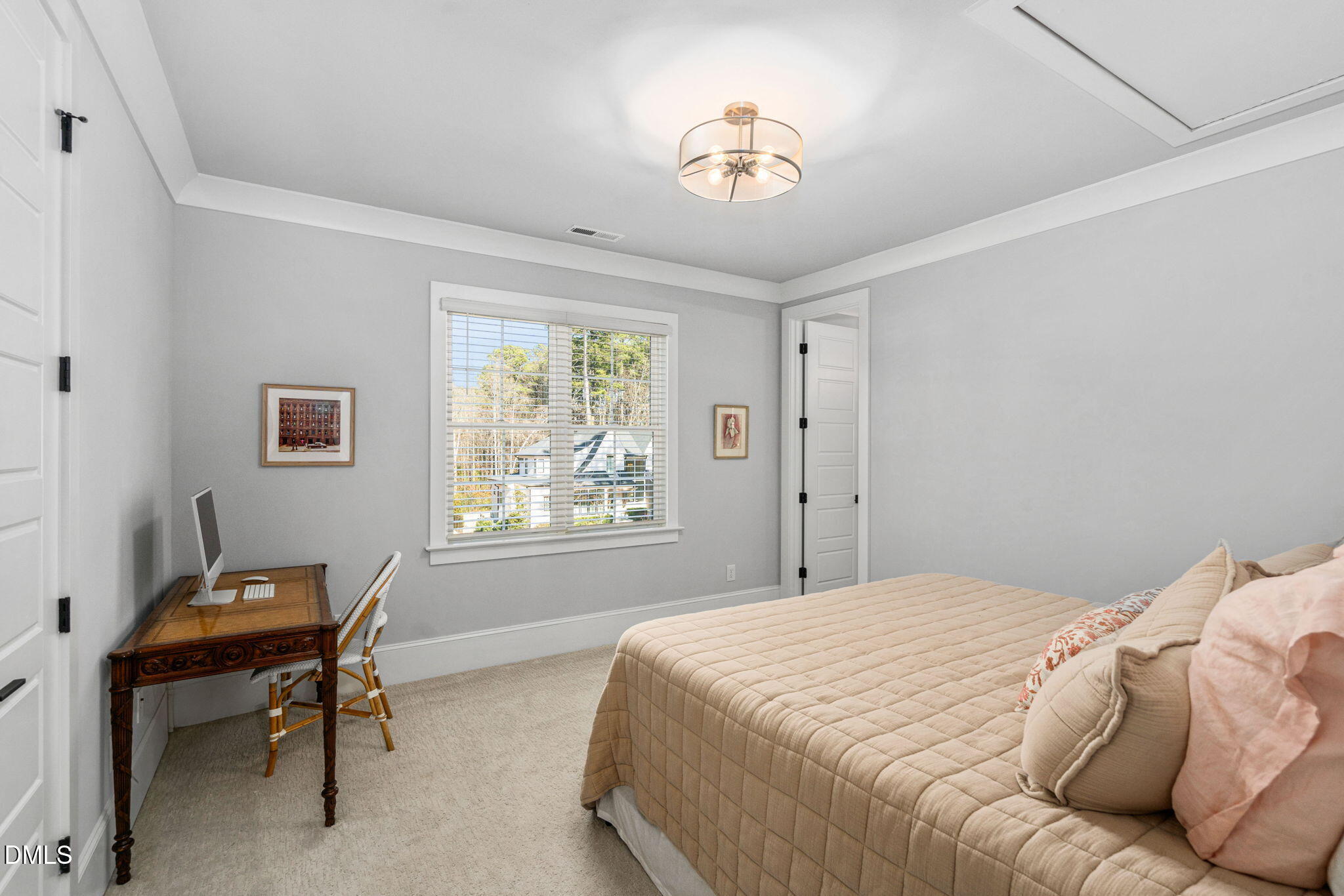 3417 Edgemont Drive Raleigh, NC 27612 - Photo 34 of 70 a bedroom with a bed and a window