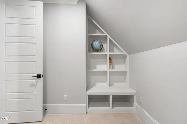 a view of a lake with a house