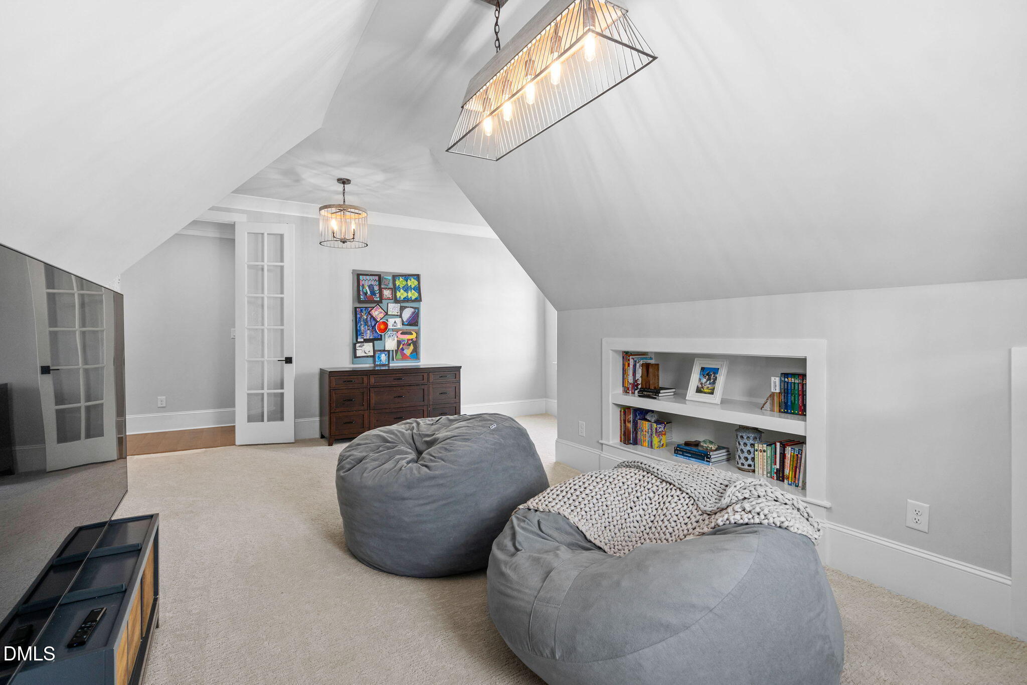 3417 Edgemont Drive Raleigh, NC 27612 - Photo 45 of 70 a living room with furniture and a flat screen tv