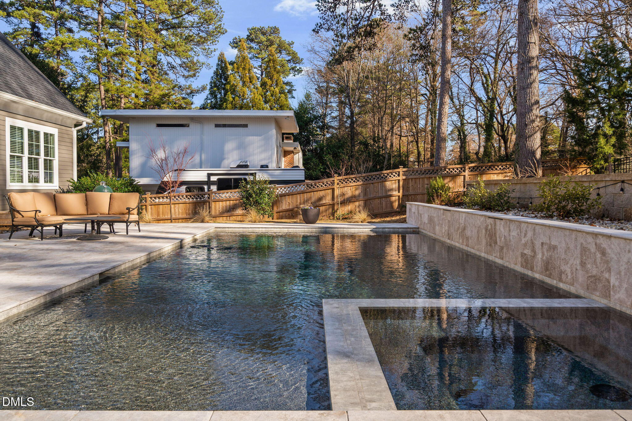 3417 Edgemont Drive Raleigh, NC 27612 - Photo 52 of 70 a view of a swimming pool with a patio