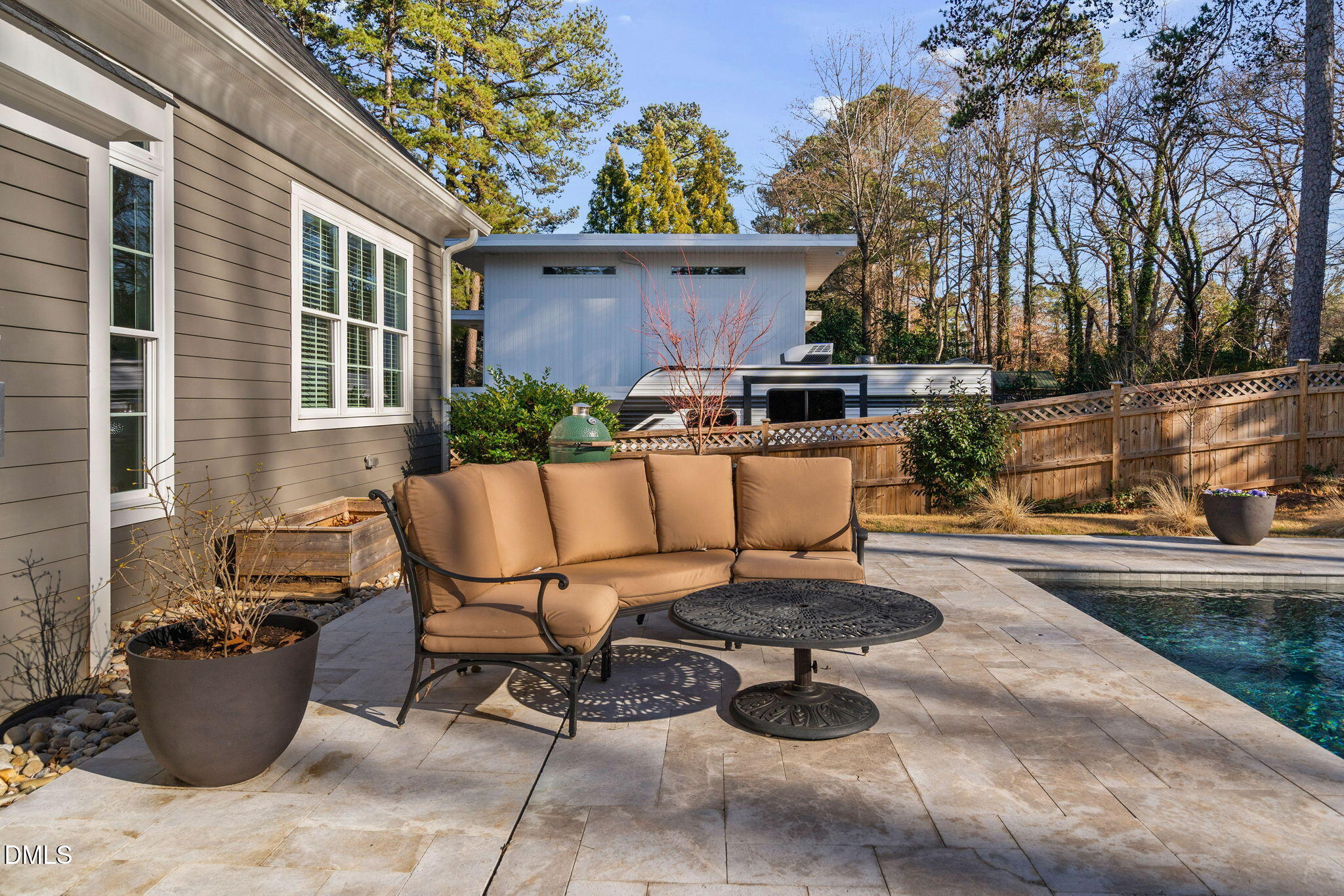 3417 Edgemont Drive Raleigh, NC 27612 - Photo 63 of 70 a view of a patio with a chairs and table in a patio
