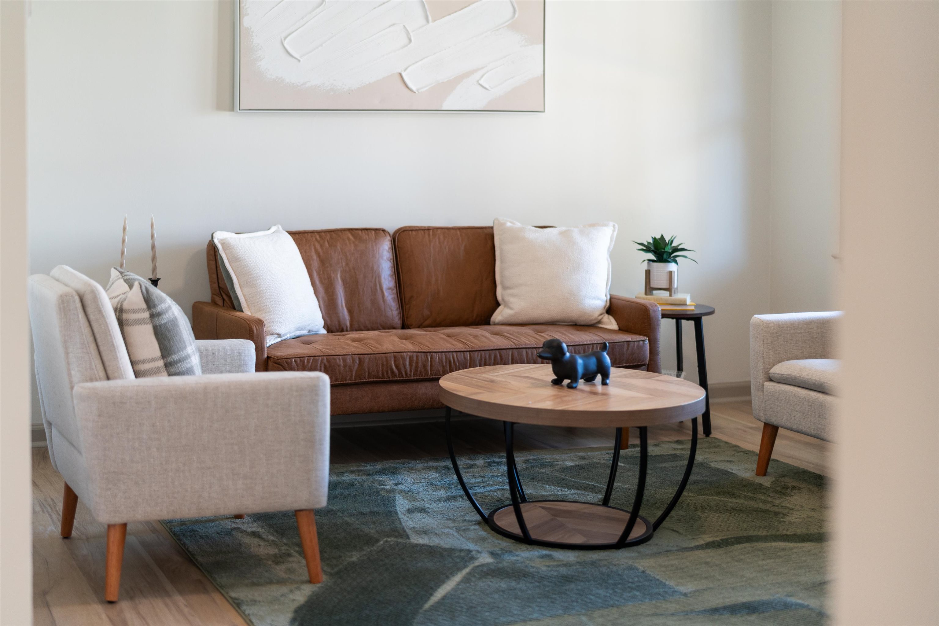 1624 Packard Street Staunton, VA 24401 - Photo 22 of 28 a living room with furniture a table and a potted plant