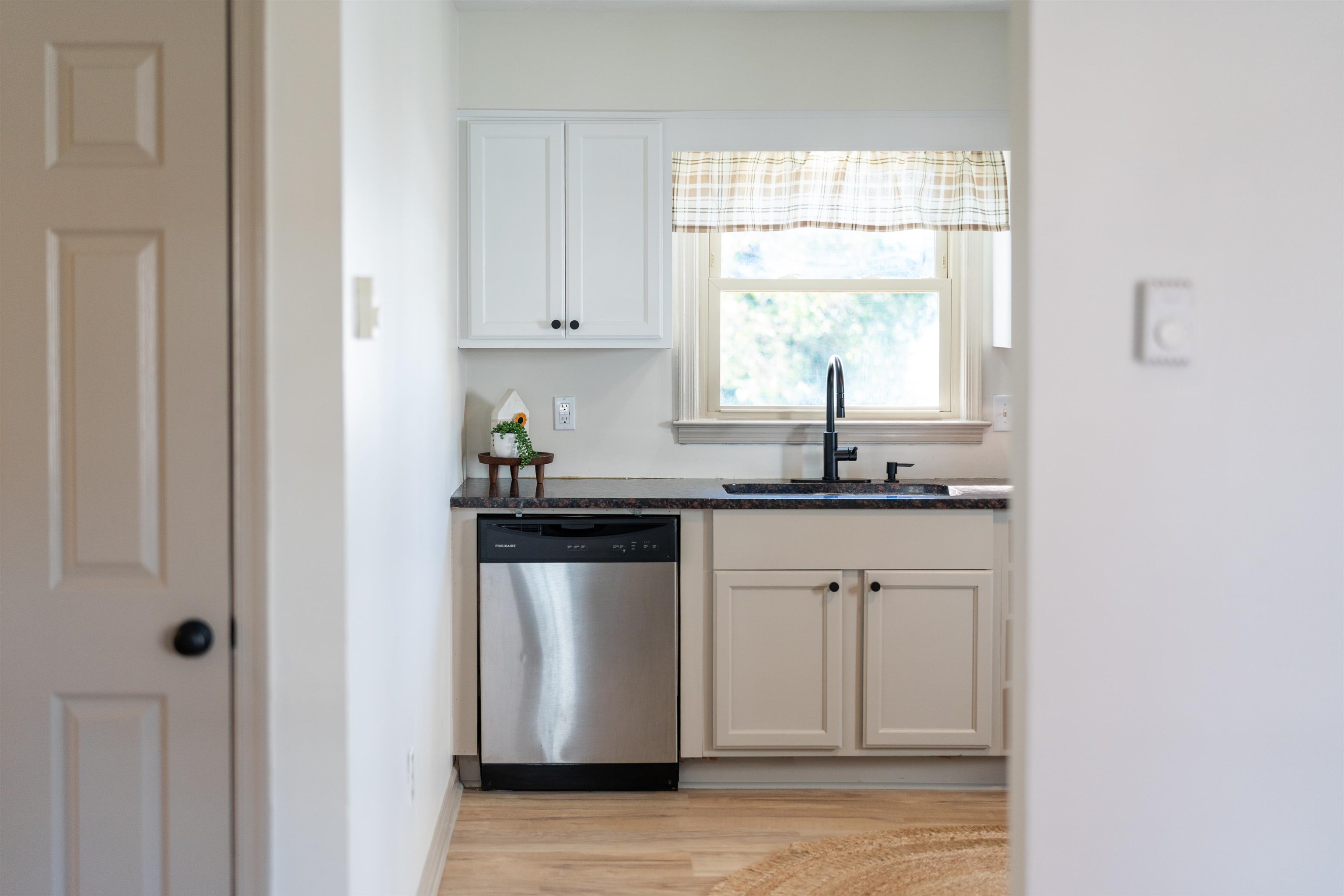1624 Packard Street Staunton, VA 24401 - Photo 24 of 28 a kitchen with granite countertop white cabinets and white appliances