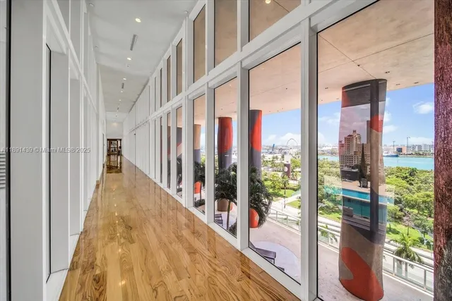 a bathroom with a tub and shower