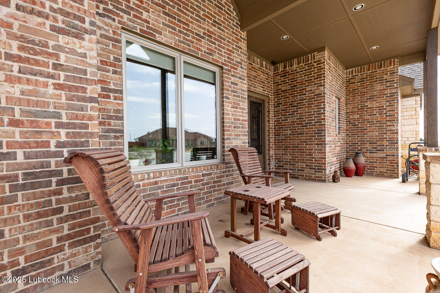 6611 Tiger Ropesville, TX 79358 - Photo 12 of 102 a view of a patio with a table and chairs and potted plants