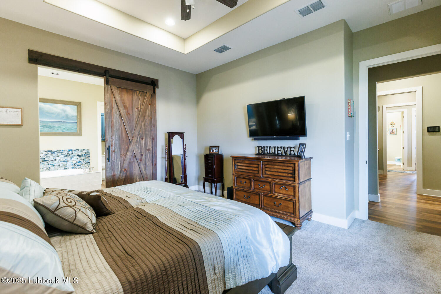 6611 Tiger Ropesville, TX 79358 - Photo 49 of 102 a bedroom with a bed and a flat screen tv